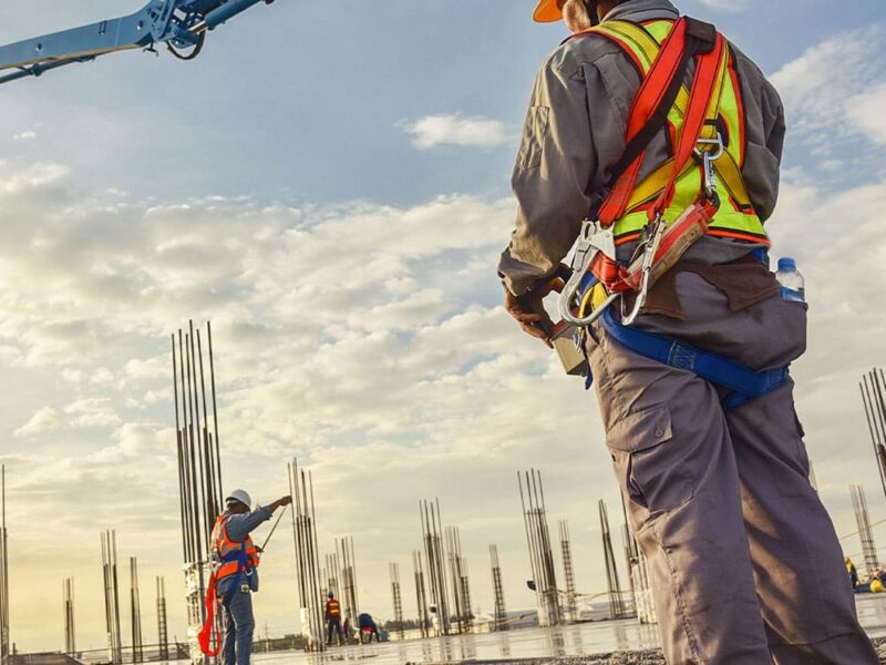 A group of construction workers on a construction site.