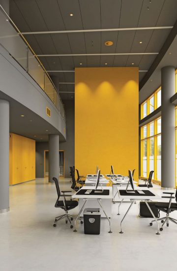 A room with a yellow wall.